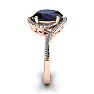 1 1/4 Carat Oval Shape Sapphire and Halo Diamond Ring In 14 Karat Rose Gold Image-3