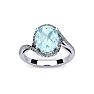 Aquamarine Ring: Aquamarine Jewelry: 1 1/3 Carat Oval Shape Aquamarine and Halo Diamond Ring In 14 Karat White Gold Image-1