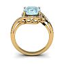 Aquamarine Ring: Aquamarine Jewelry: 1 1/3 Carat Oval Shape Aquamarine and Halo Diamond Ring In 14 Karat Yellow Gold Image-4
