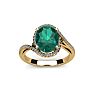 1 1/3 Carat Oval Shape Emerald and Halo Diamond Ring In 14 Karat Yellow Gold Image-1