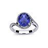 1 1/2 Carat Oval Shape Tanzanite and Halo Diamond Ring In 14 Karat White Gold Image-1