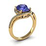 1 1/2 Carat Oval Shape Tanzanite and Halo Diamond Ring In 14 Karat Yellow Gold Image-2