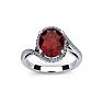 Garnet Ring: Garnet Jewelry: 1 3/4 Carat Oval Shape Garnet and Halo Diamond Ring In 14 Karat White Gold Image-1