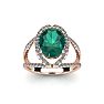 1 1/2 Carat Oval Shape Emerald and Halo Diamond Ring In 14 Karat Rose Gold
 Image-1