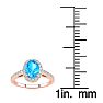 1 1/3 Carat Oval Shape Blue Topaz and Halo Diamond Ring In 14 Karat Rose Gold Image-5