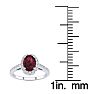 Garnet Ring: Garnet Jewelry: 1 1/3 Carat Oval Shape Garnet and Halo Diamond Ring In 14 Karat White Gold Image-5