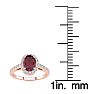 1 1/4 Carat Oval Shape Ruby and Halo Diamond Ring In 14 Karat Rose Gold Image-5