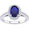 1 1/3 Carat Oval Shape Sapphire and Halo Diamond Ring In 14 Karat White Gold