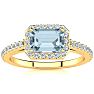 Aquamarine Ring: Aquamarine Jewelry: 1 1/4 Carat Aquamarine and Halo Diamond Ring In 14 Karat Yellow Gold Image-1