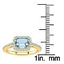Aquamarine Ring: Aquamarine Jewelry: 1 1/4 Carat Aquamarine and Halo Diamond Ring In 14 Karat Yellow Gold Image-5