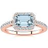 Aquamarine Ring: Aquamarine Jewelry: 1 1/4 Carat Aquamarine and Halo Diamond Ring In 14 Karat Rose Gold Image-1