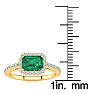 1 1/4 Carat Emerald and Halo Diamond Ring In 14 Karat Yellow Gold Image-5