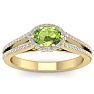 1 1/3 Carat Oval Shape Antique Peridot and Halo Diamond Ring In 14 Karat Yellow Gold Image-1
