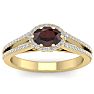 Garnet Ring: Garnet Jewelry: 1 1/2 Carat Oval Shape Antique Garnet and Halo Diamond Ring In 14 Karat Yellow Gold Image-1