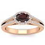 Garnet Ring: Garnet Jewelry: 1 1/2 Carat Oval Shape Antique Garnet and Halo Diamond Ring In 14 Karat Rose Gold Image-1