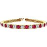 Ruby Bracelet; Ruby Tennis Bracelet; 10 3/4 Carat Ruby and Diamond Tennis Bracelet In 14 Karat Yellow Gold Image-1