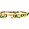 9 1/5 Carat Peridot and Diamond Alternating Tennis Bracelet In 14 Karat Yellow Gold, 7 Inches Image-3