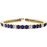 9 Carat Tanzanite and Diamond Alternating Tennis Bracelet In 14 Karat Yellow Gold, 7 Inches Image-1
