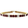 Garnet Bracelet: Garnet Jewelry: 12 3/4 Carat Garnet and Diamond Alternating Tennis Bracelet In 14 Karat Yellow Gold, 9 Inches Image-1