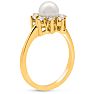 Round Freshwater Cultured Pearl and 1/3 Carat Halo Diamond Ring In 14 Karat Yellow Gold Image-5