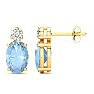 Aquamarine Earrings: Aquamarine Jewelry: 1 Carat Oval Aquamarine and Diamond Stud Earrings In 14 Karat Yellow Gold Image-1