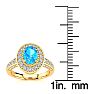 1 2/3 Carat Oval Shape Blue Topaz and Halo Diamond Ring In 14 Karat Yellow Gold Image-5