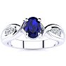 1 Carat Oval Shape Sapphire and Four Diamond Ring In 10 Karat White Gold Image-1