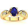 1 Carat Oval Shape Sapphire and Four Diamond Ring In 10 Karat Yellow Gold Image-1