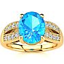 2 1/3 Carat Oval Shape Blue Topaz and Diamond Ring In 14 Karat Yellow Gold Image-1
