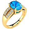 2 1/3 Carat Oval Shape Blue Topaz and Diamond Ring In 14 Karat Yellow Gold Image-2