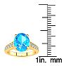 2 1/2 Carat Oval Shape Blue Topaz and Diamond Ring In 14 Karat Yellow Gold Image-5