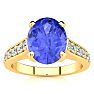 2 1/4 Carat Oval Shape Tanzanite and Diamond Ring In 14 Karat Yellow Gold Image-1
