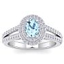 Aquamarine Ring: Aquamarine Jewelry: 1 3/4 Carat Oval Shape Aquamarine and Halo Diamond Ring In 14 Karat White Gold Image-1