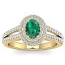 1 3/4 Carat Oval Shape Emerald and Halo Diamond Ring In 14 Karat Yellow Gold Image-1