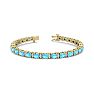 6 Carat Oval Shape Blue Topaz and Diamond Bracelet In 14 Karat Yellow Gold, 7 Inches Image-1