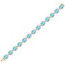 24 Carat Oval Shape Blue Topaz and Halo Diamond Bracelet In 14 Karat Yellow Gold, 7 Inches Image-3