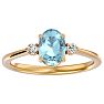 Aquamarine Ring: Aquamarine Jewelry: 1 1/4 Carat Oval Shape Aquamarine and Two Diamond Ring In 14 Karat Yellow Gold Image-1