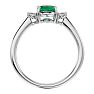 1 1/4 Carat Oval Shape Emerald and Two Diamond Ring In 14 Karat White Gold Image-3