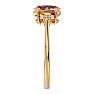 1-1/4 Carat Oval Shape Morganite and Two Diamond Ring In 14 Karat Yellow Gold Image-4