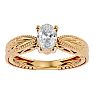 3/4 Carat Oval Shape Diamond Solitaire Engagement Ring with Tapered Etched Band In 14 Karat Yellow Gold Image-1