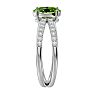 1.60 Carat Oval Shape Peridot and Diamond Ring In 14 Karat White Gold Image-4