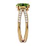 1.60 Carat Oval Shape Peridot and Diamond Ring In 14 Karat Yellow Gold Image-4