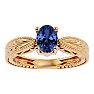 1 1/3 Carat Oval Shape Tanzanite Ring With Tapered Etched Band In 14 Karat Yellow Gold Image-1