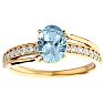 Aquamarine Ring: Aquamarine Jewelry: 1 1/3 Carat Oval Shape Aquamarine and Diamond Ring In 14 Karat Yellow Gold Image-1