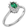 2/3 Carat Oval Shape Emerald and Halo Diamond Ring In 14 Karat White Gold Image-2