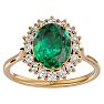 2 3/4 Carat Oval Shape Emerald and Halo Diamond Ring In 14 Karat Yellow Gold Image-1