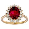 3.60 Carat Oval Shape Ruby and Halo Diamond Ring In 14 Karat Yellow Gold Image-1