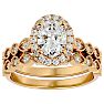 1 1/2 Carat Oval Shape Diamond Bridal Set In 14 Karat Yellow Gold Image-1