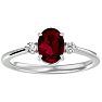 Ruby Ring: 1 1/3 Carat Oval Shape Created Ruby and Two Diamond Ring In Sterling Silver Image-1