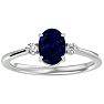 Sapphire Ring: 1 1/3 Carat Oval Shape Created Sapphire and Two Diamond Ring In Sterling Silver Image-1